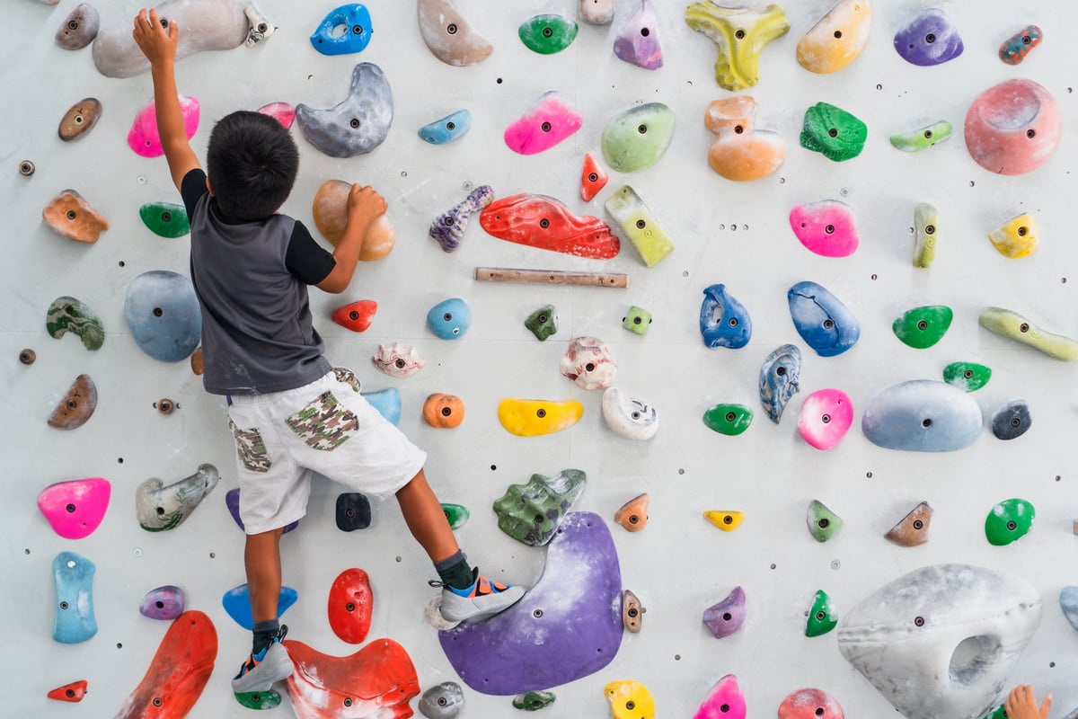 Kid bouldering.